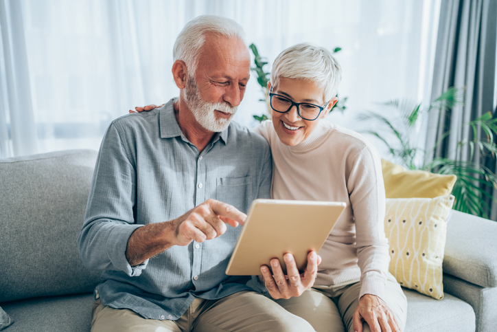 Old couple looking at affordable life insurance options