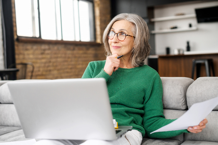 Senior woman thinking about making smart financial decisions