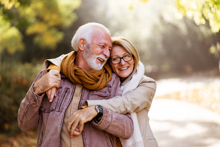 Happy older couple enjoying the peace of mind that comes with life insurance